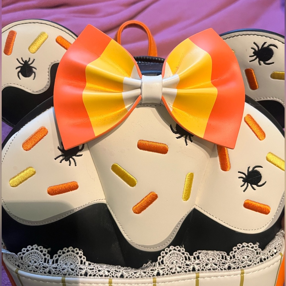 Loungefly x Disney Minnie Mouse Candy Corn Cupcake Mini Backpack Glow in Dark - Picture 4 of 11